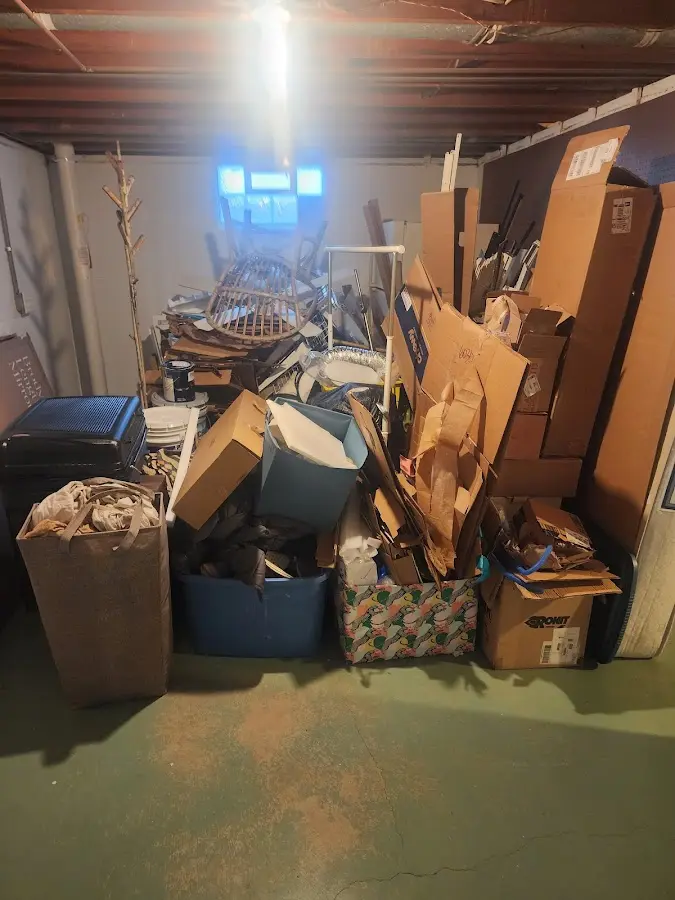 Roll-off dumpster container at job site for 2 Yard Dumpster Rental in Bellwood